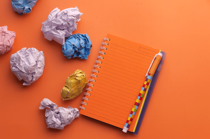 journal notebook and crumpled paper